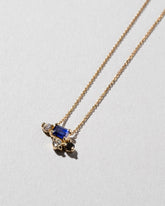  Cosmic Dawn Necklace on light color background.