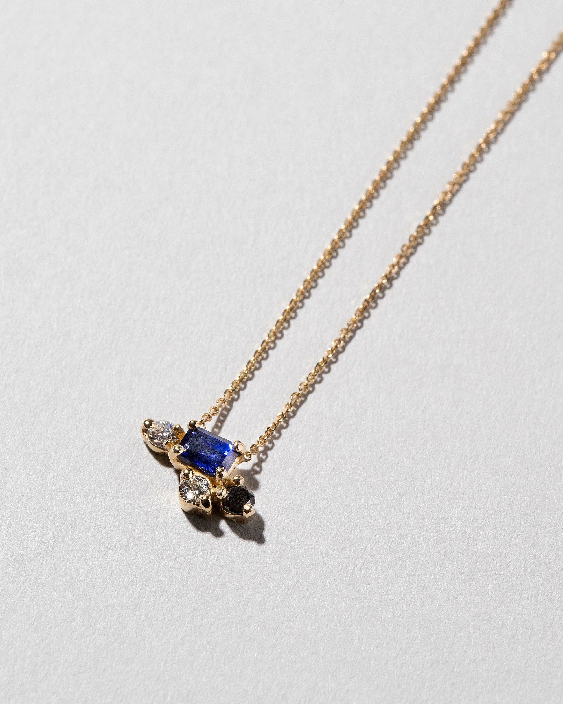  Cosmic Dawn Necklace on light color background.