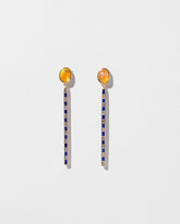  Ethiopian Opal Transformation Earrings on light color background.