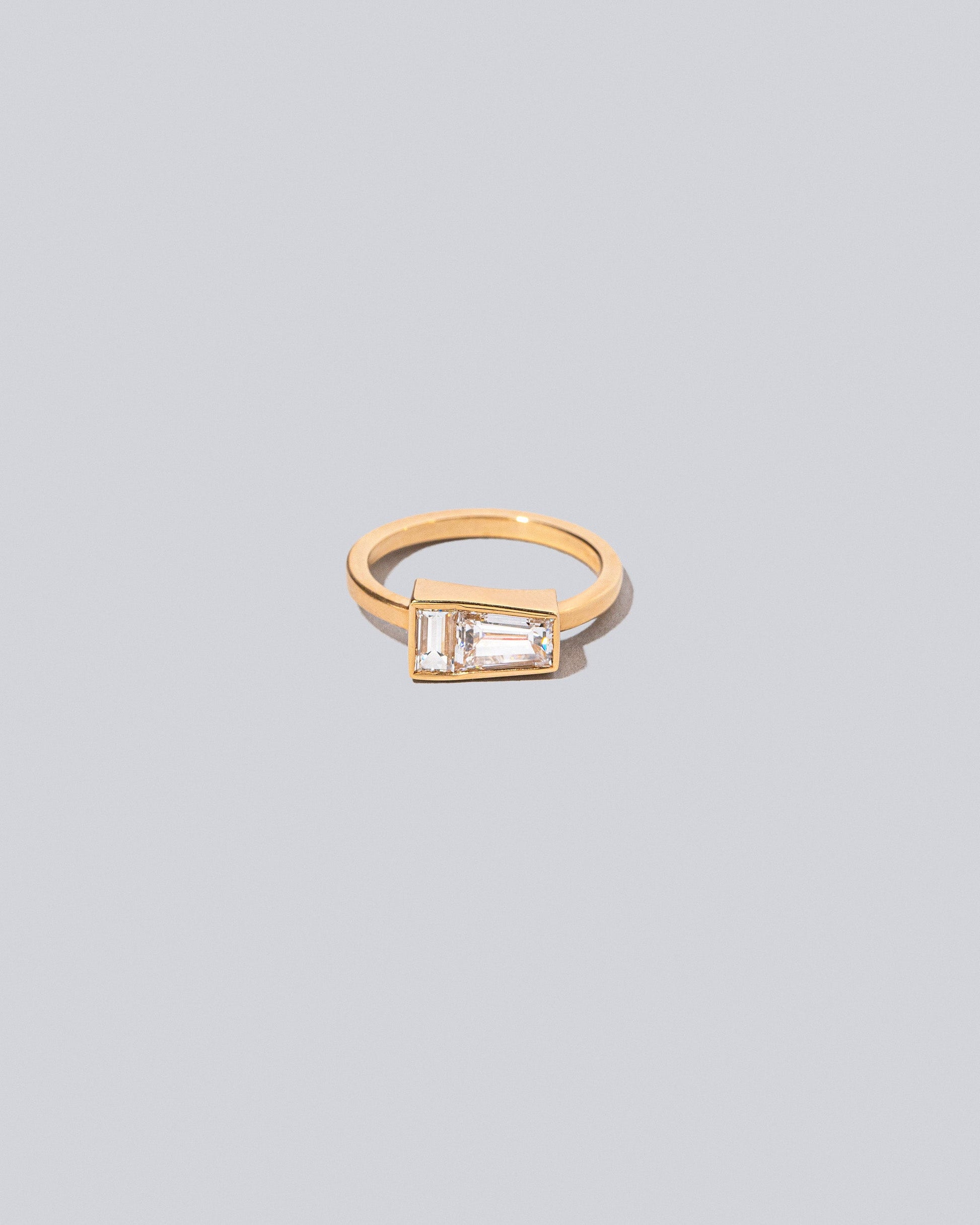 Ode Ring on light color background.