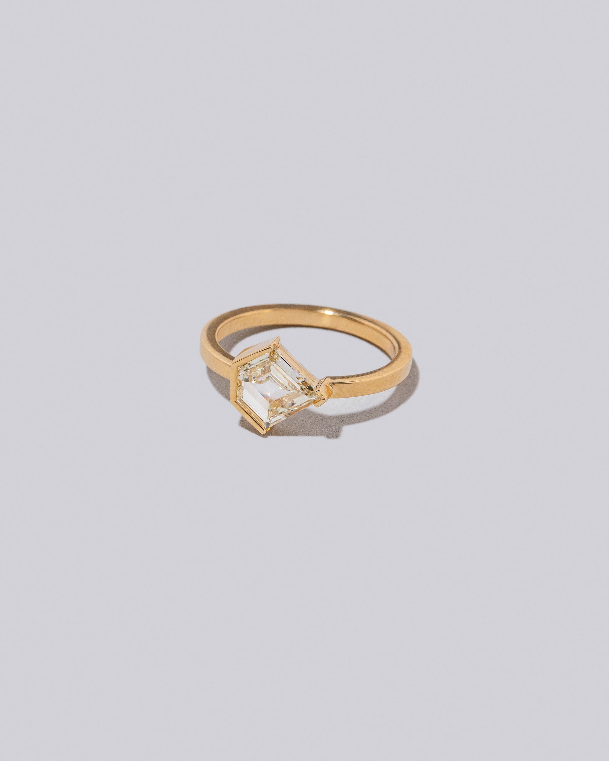View from the side of the Sonata Ring on light color background.