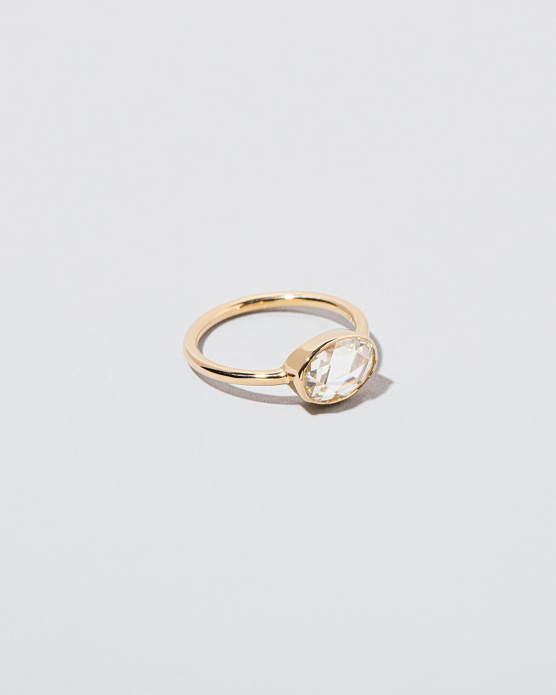 View from the side of the Ellipse Ring on light color background.