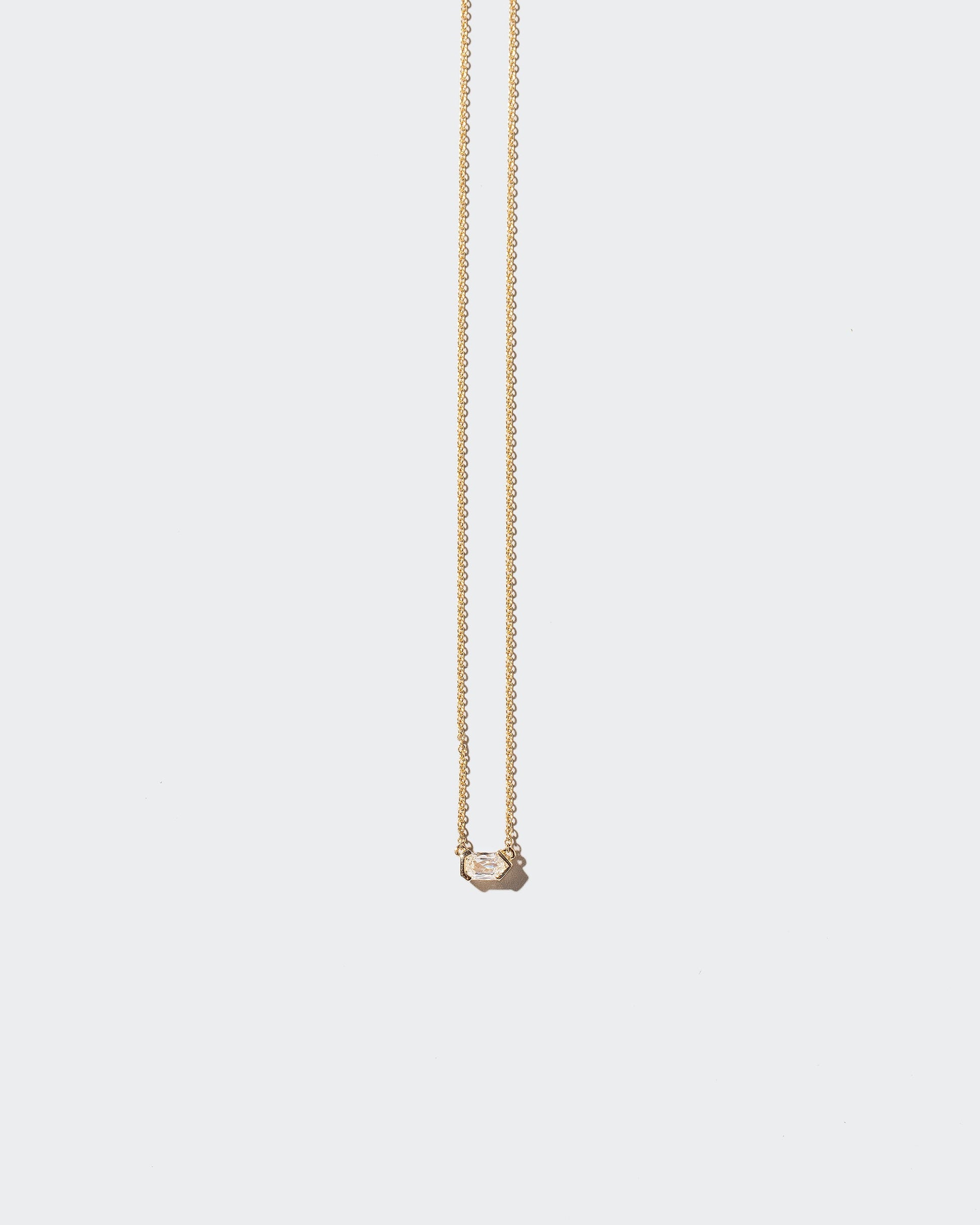  Adder Necklace on light color background.