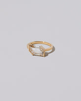 View from the side of the Heart & Soul Ring on light color background.