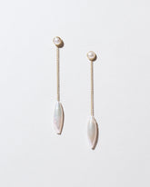  Navette Pearl Drop Earrings on light color background.