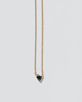  Rise Necklace on light color background.