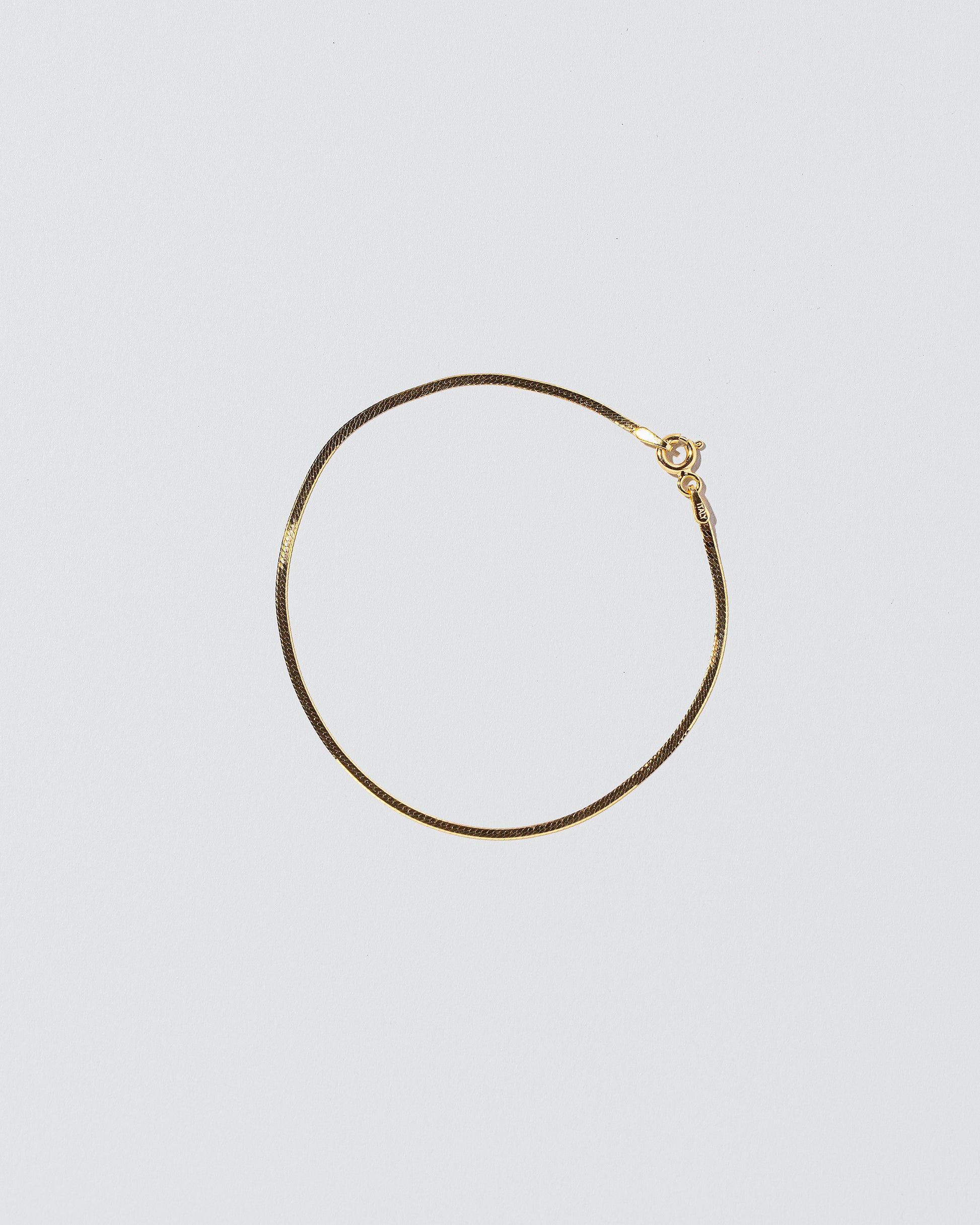  Liquid Chain Bracelet on light color background.
