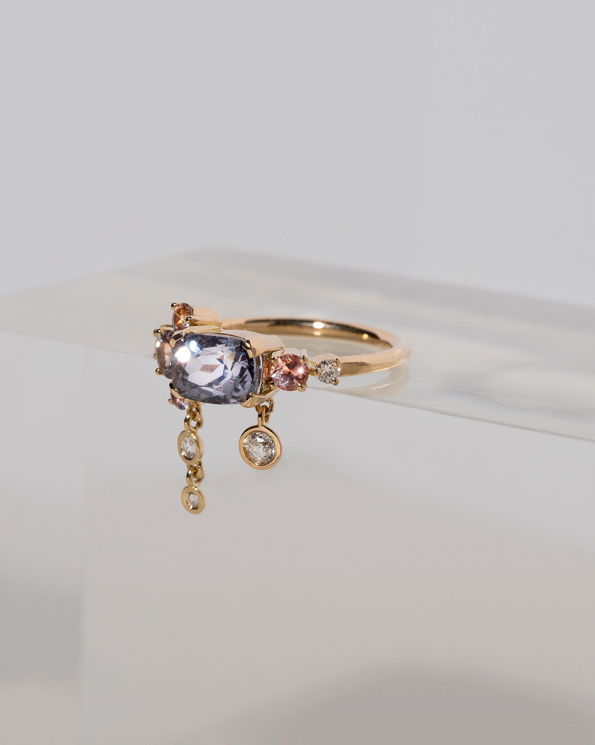  Nivithigala Sapphire Cluster Ring on light color background.