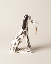 Eleonor Boström Key Dog on light color background.