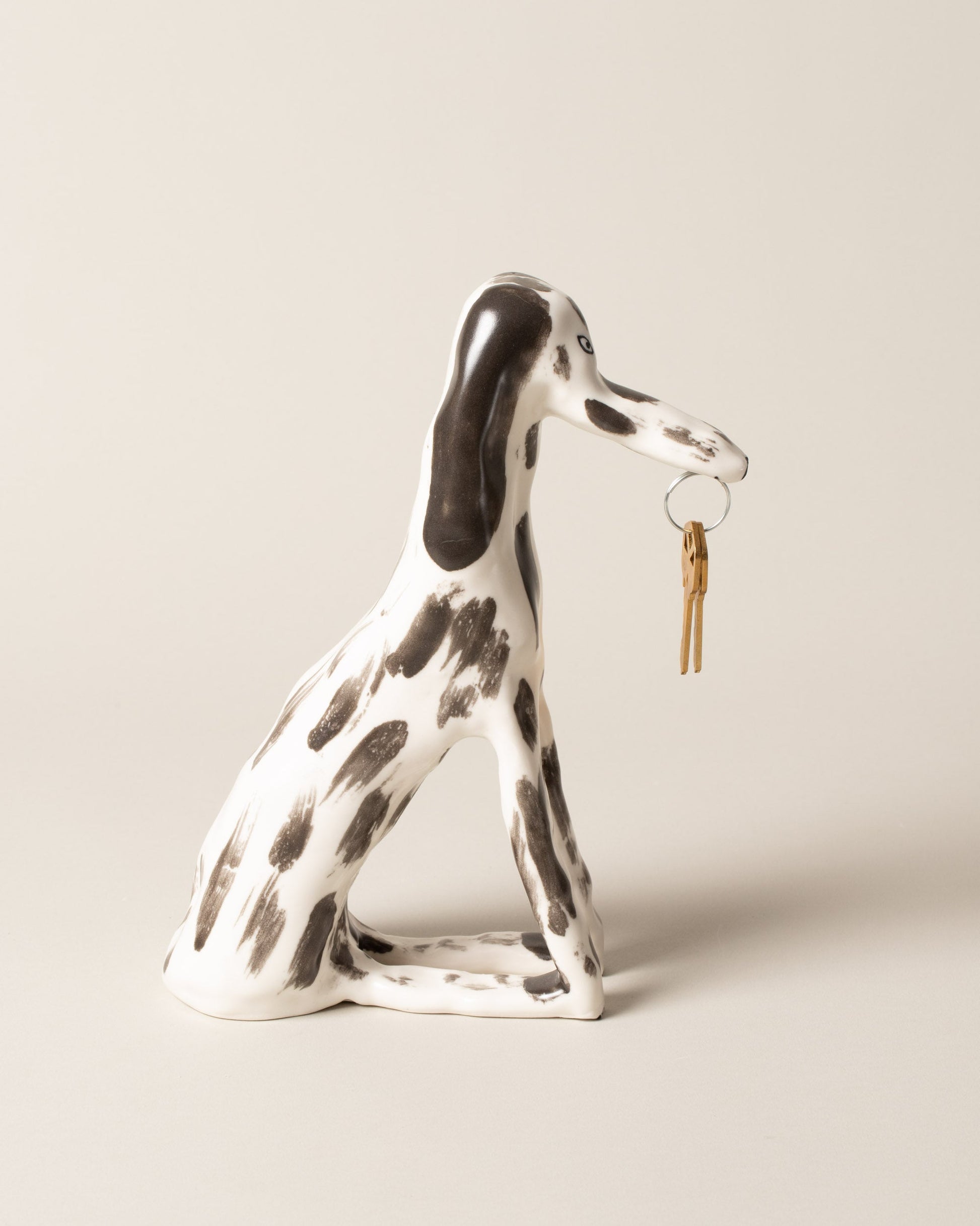 Eleonor Boström Key Dog on light color background.