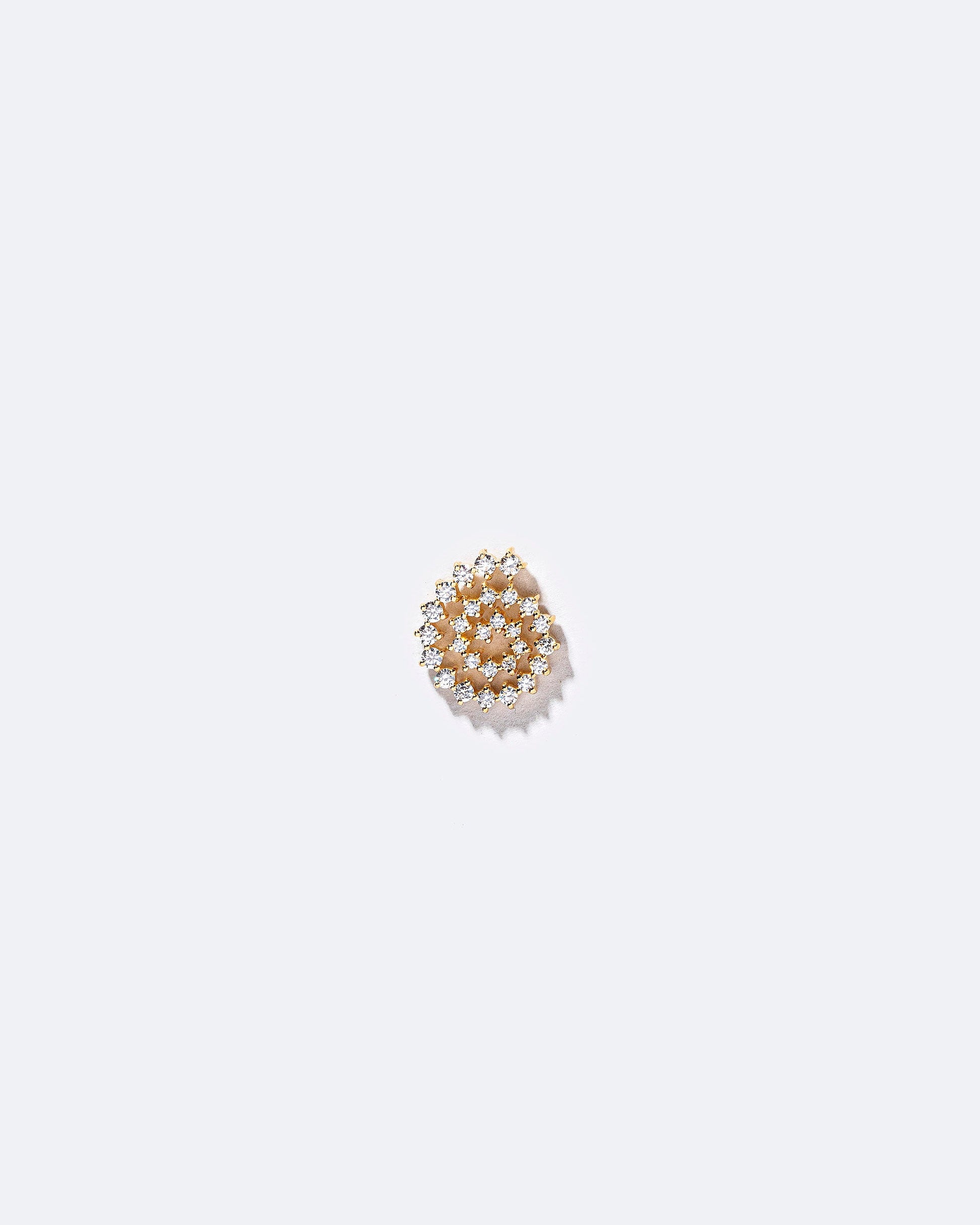 Full White Diamond Right Spiral Stud Earring Single on light color background.