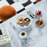 product_details::Styled image featuring the Jelly Toast Charm, Sausage Links Charm and Sunny Side Up Egg Charm.