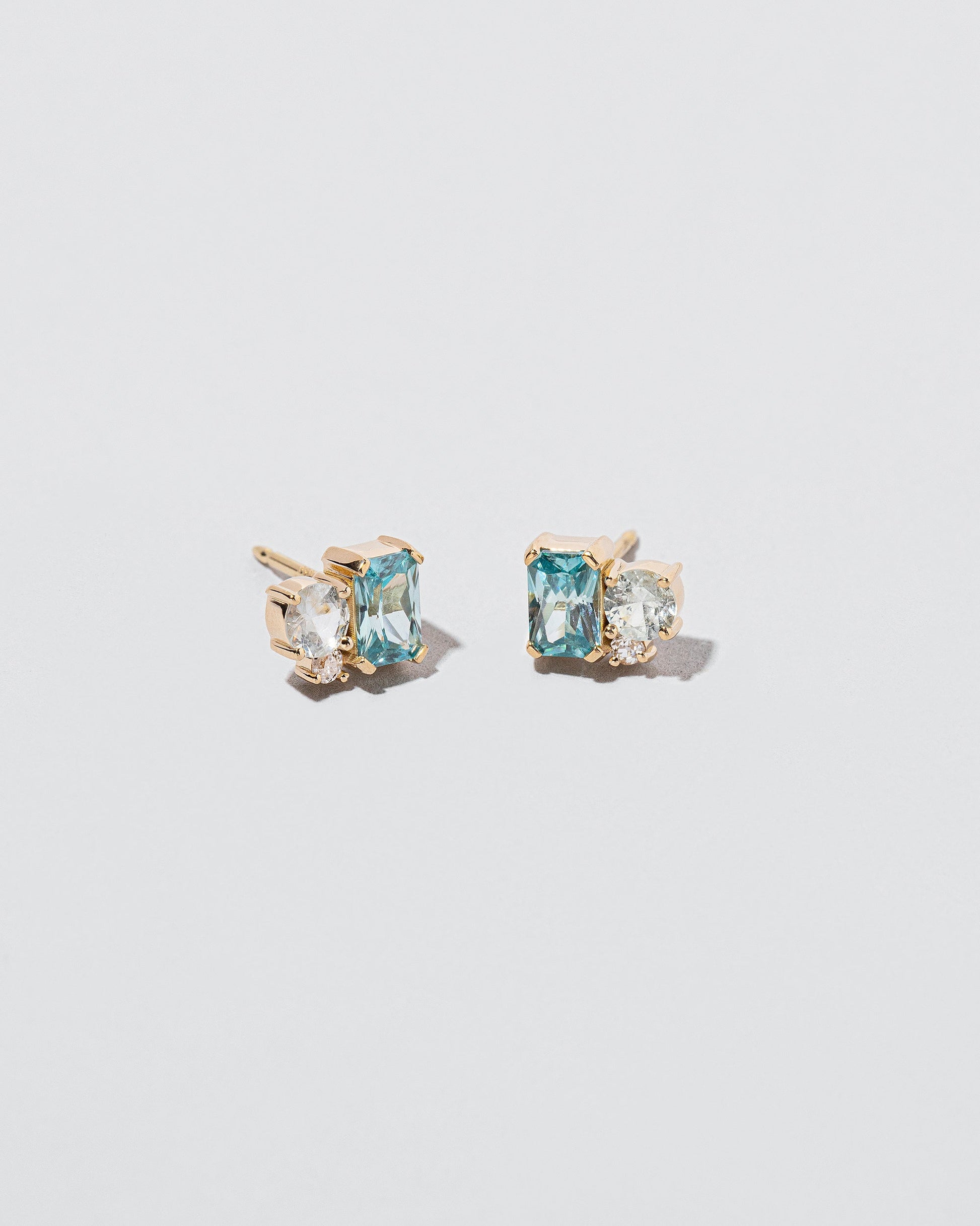  Sky Earrings on light color background.