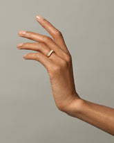 Gold Pink Opal Five Triangle Ring on model.
