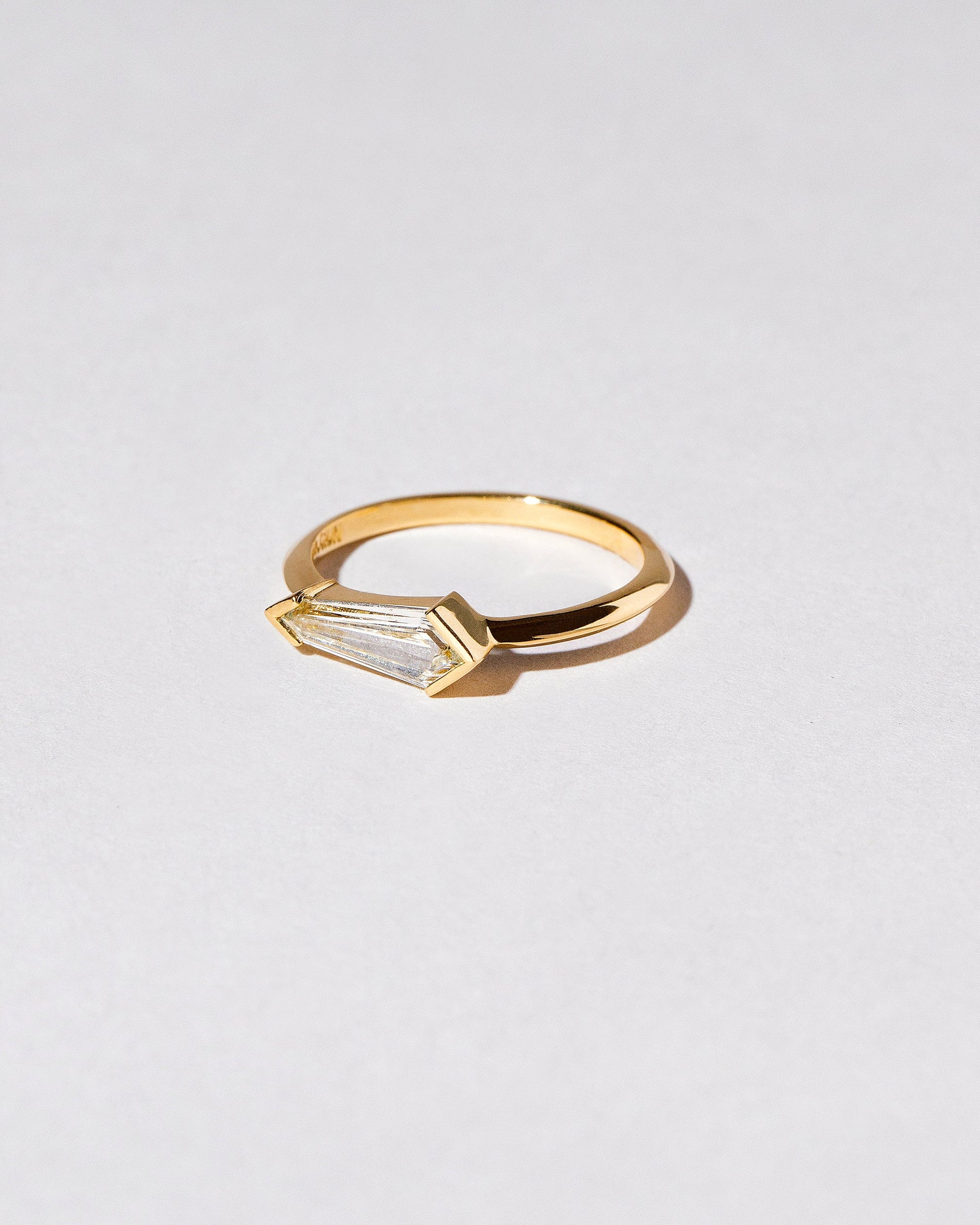 View from the side of the Lacerta Ring on light color background.