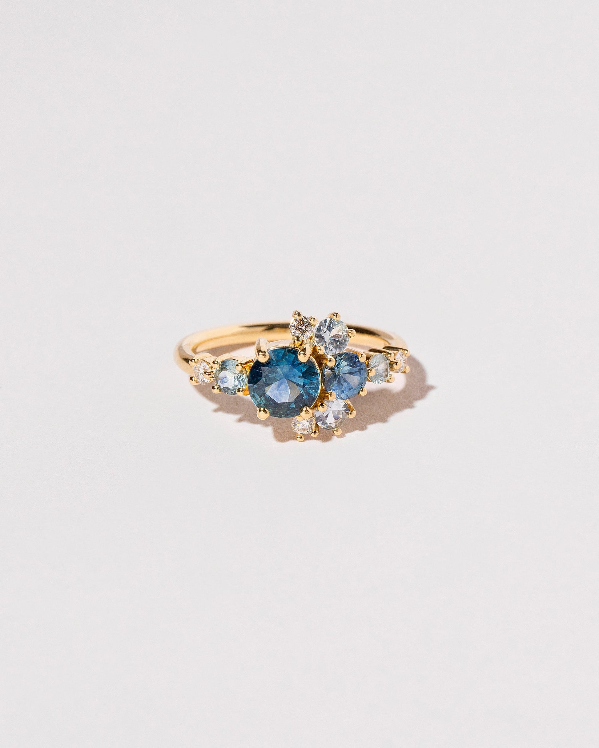  Montana Sapphire Crescent Ring on light color background.