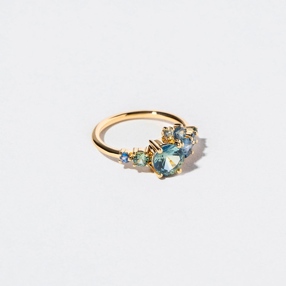 product_details:: Luna Ring - Bicolor Sapphire on light color background.