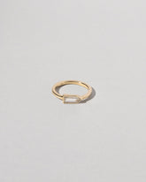 Bullet Cut Diamond Ring on light color background.