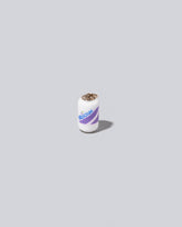 Mociun Soda Charm on light color background.