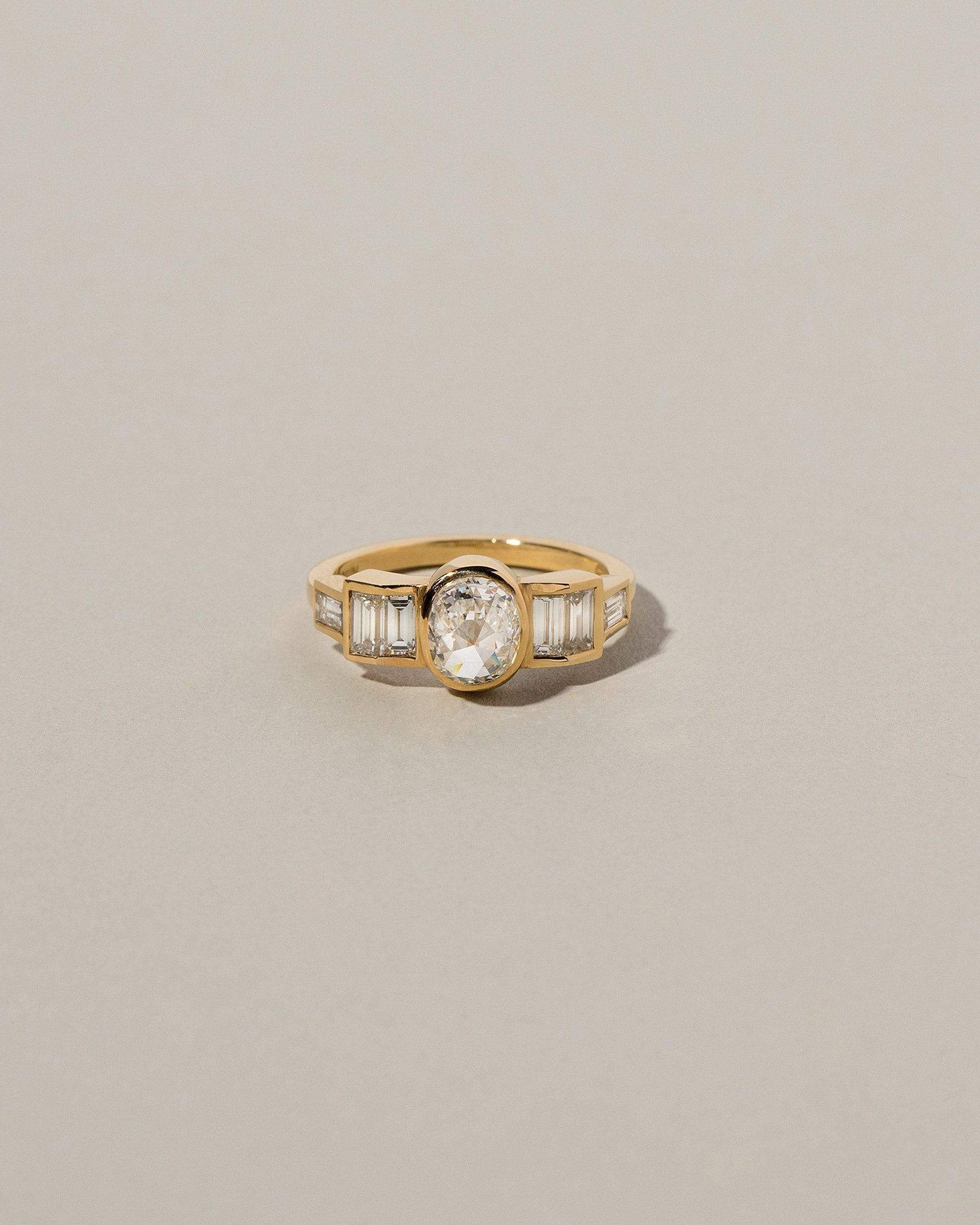  Modified Brilliant Diamond Ring on light color background.