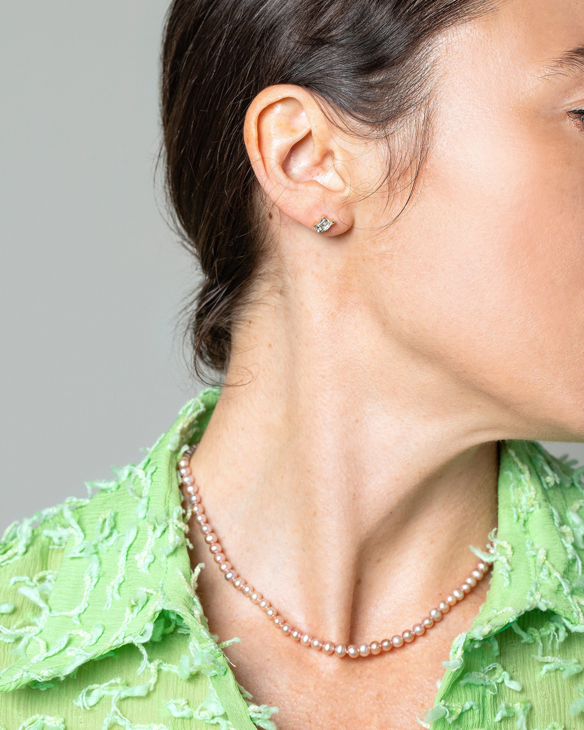 Reciprocating Earrings on model.