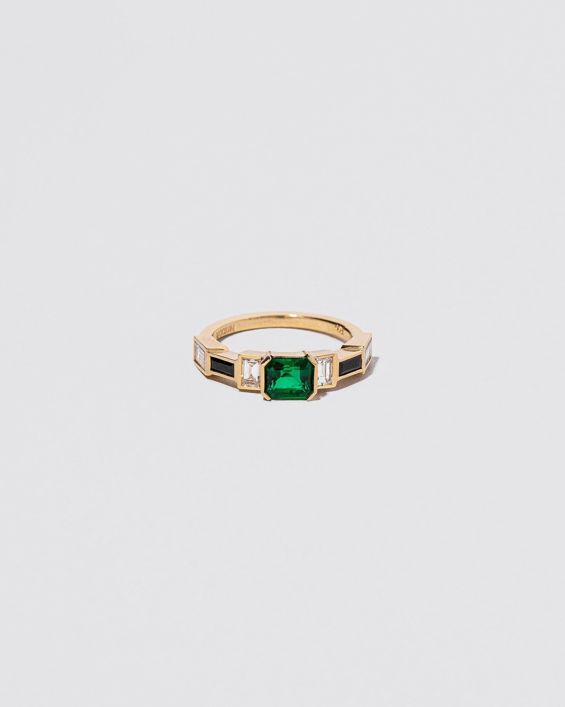  Harmonization Ring on light color background.