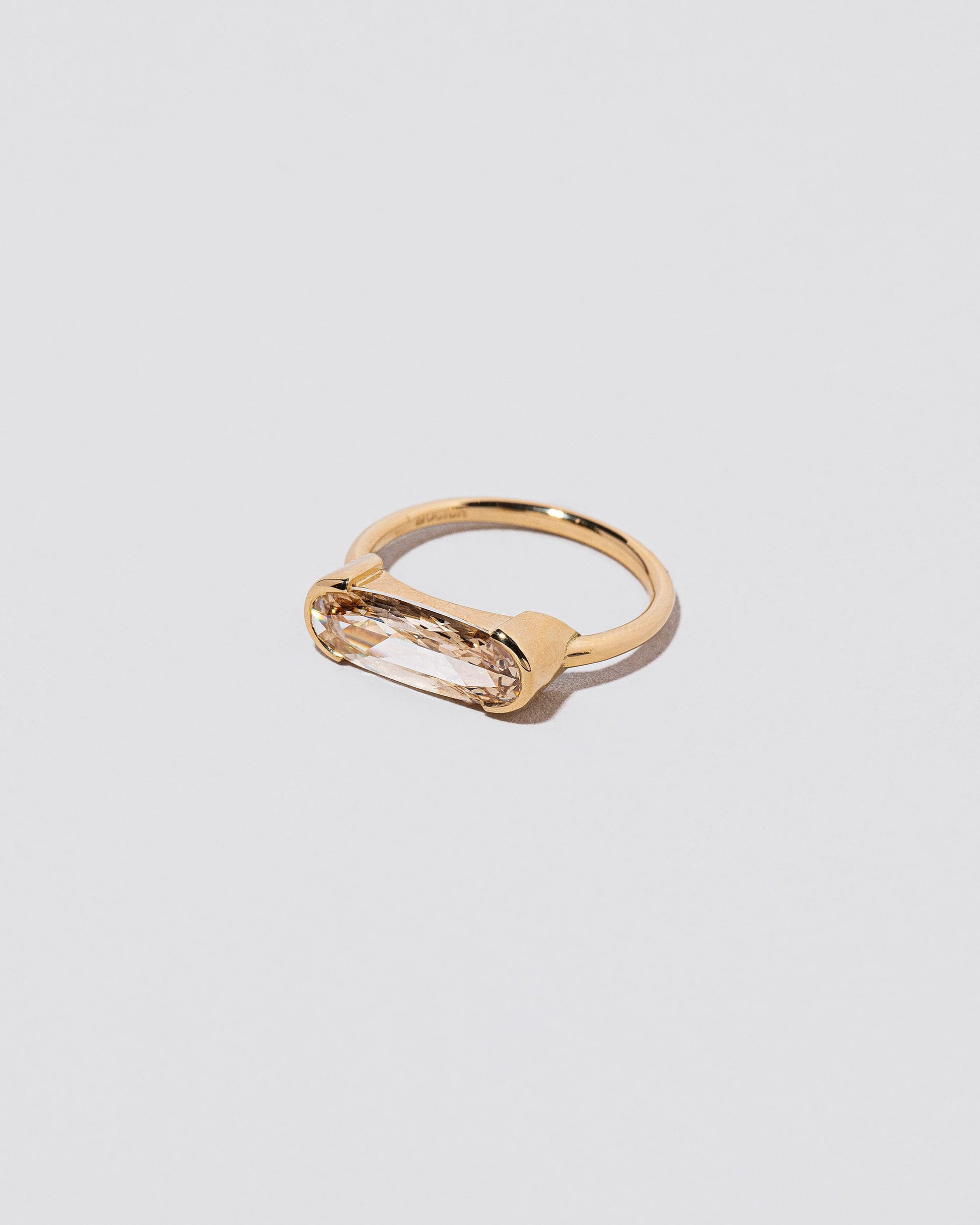 View from the side of the Dancing Ring on light color background.