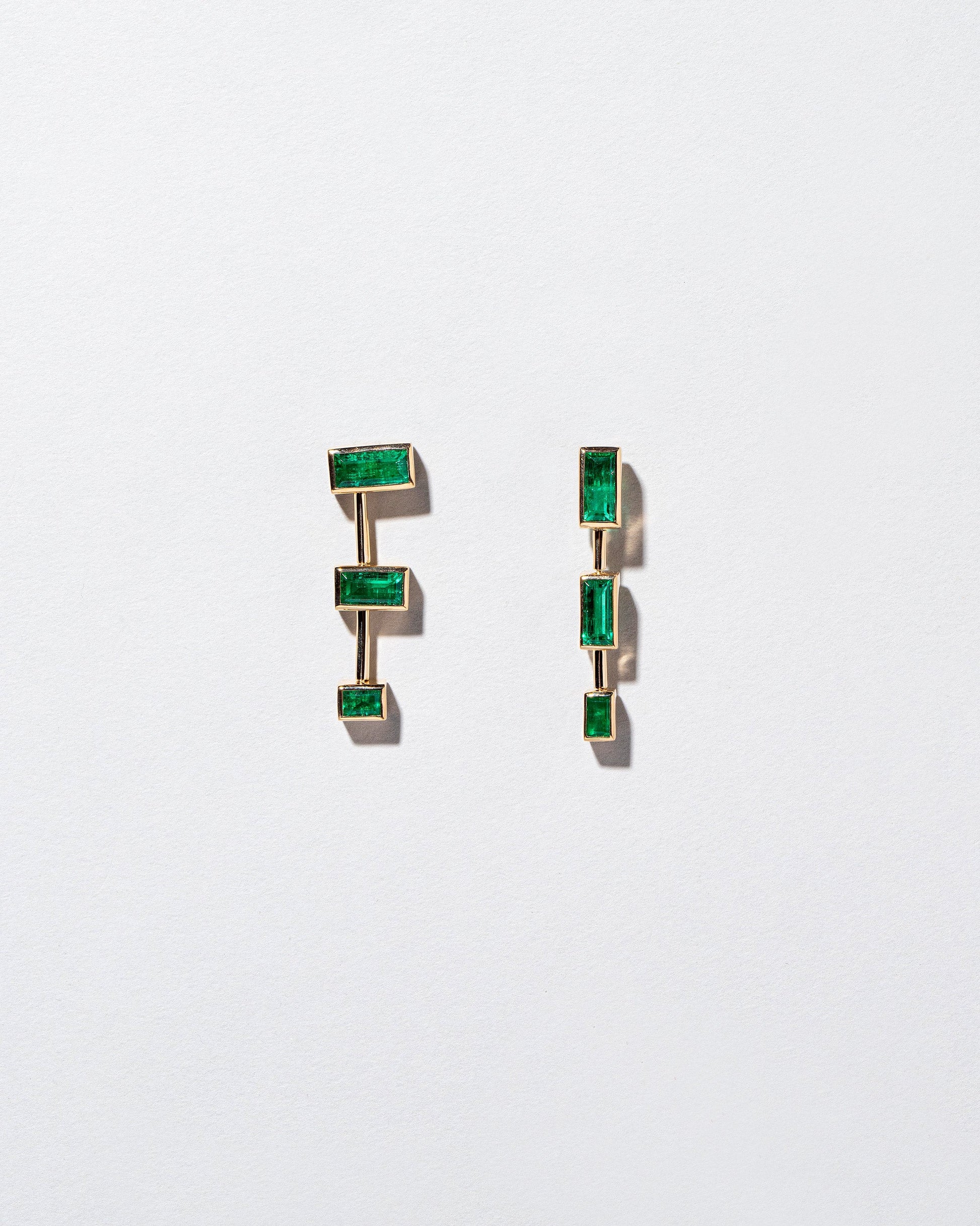  The Listening One Earrings on light color background.