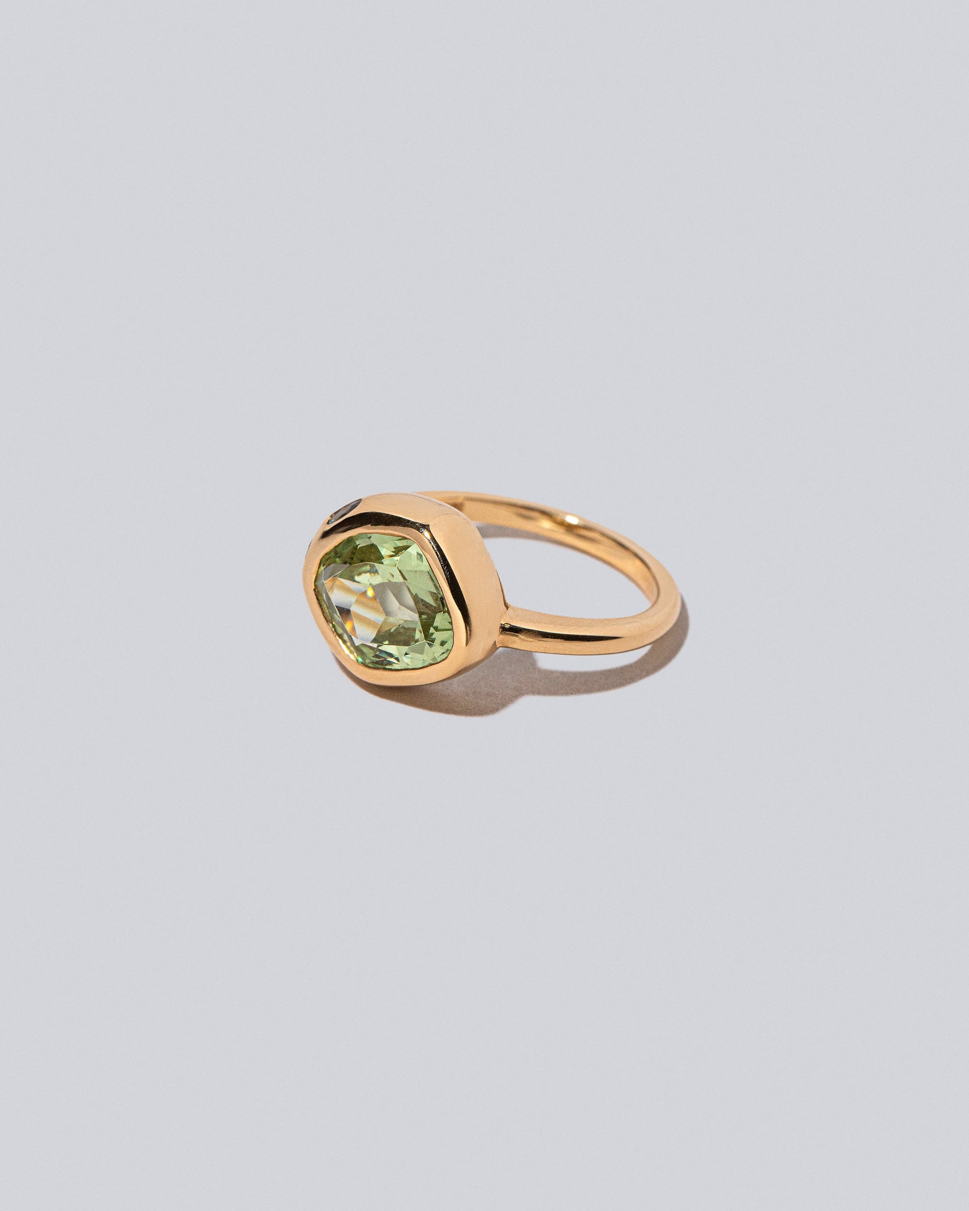 View from the side of the Yarrow Ring on light color background.
