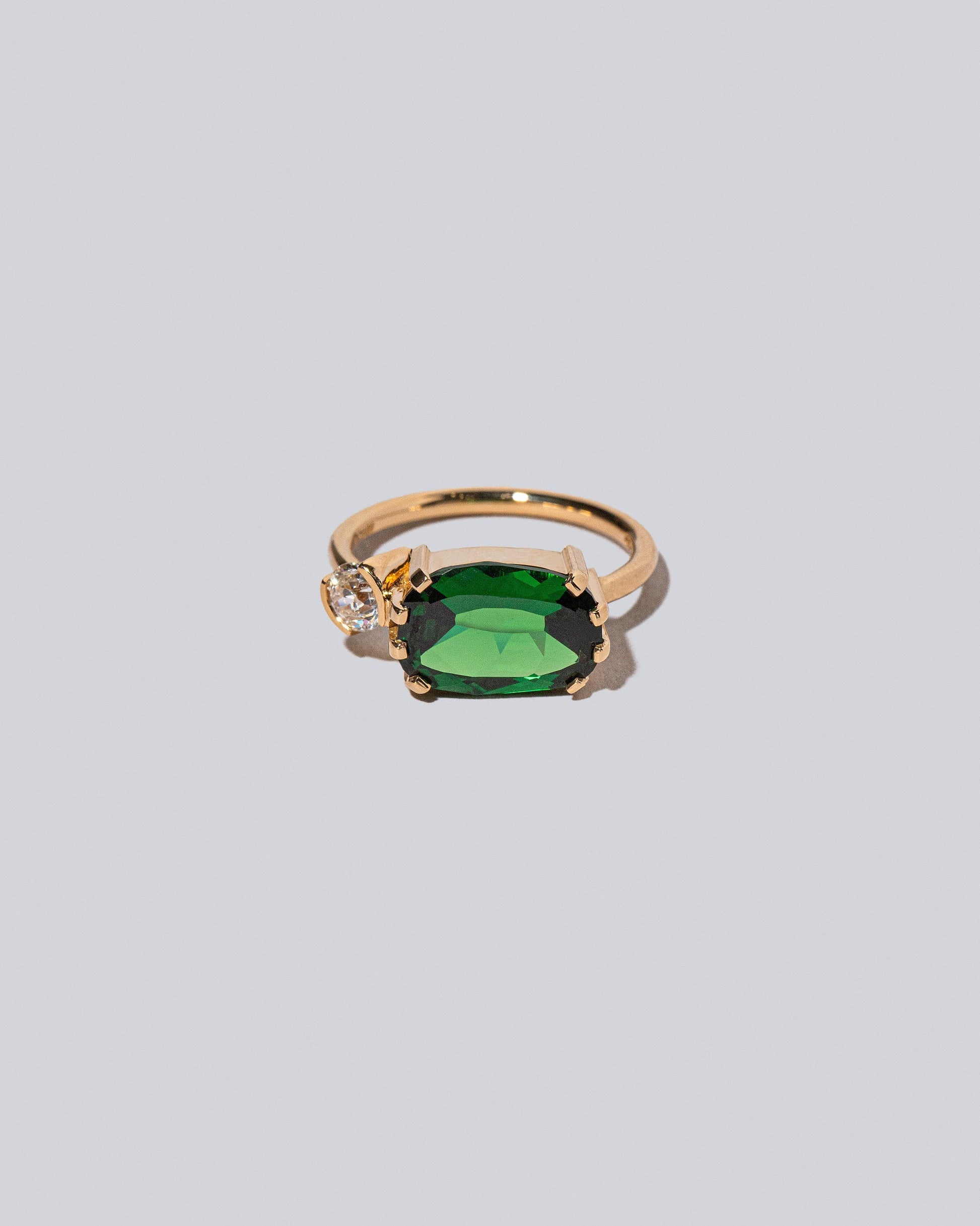 Product photo of the Datura Ring on a light color background 