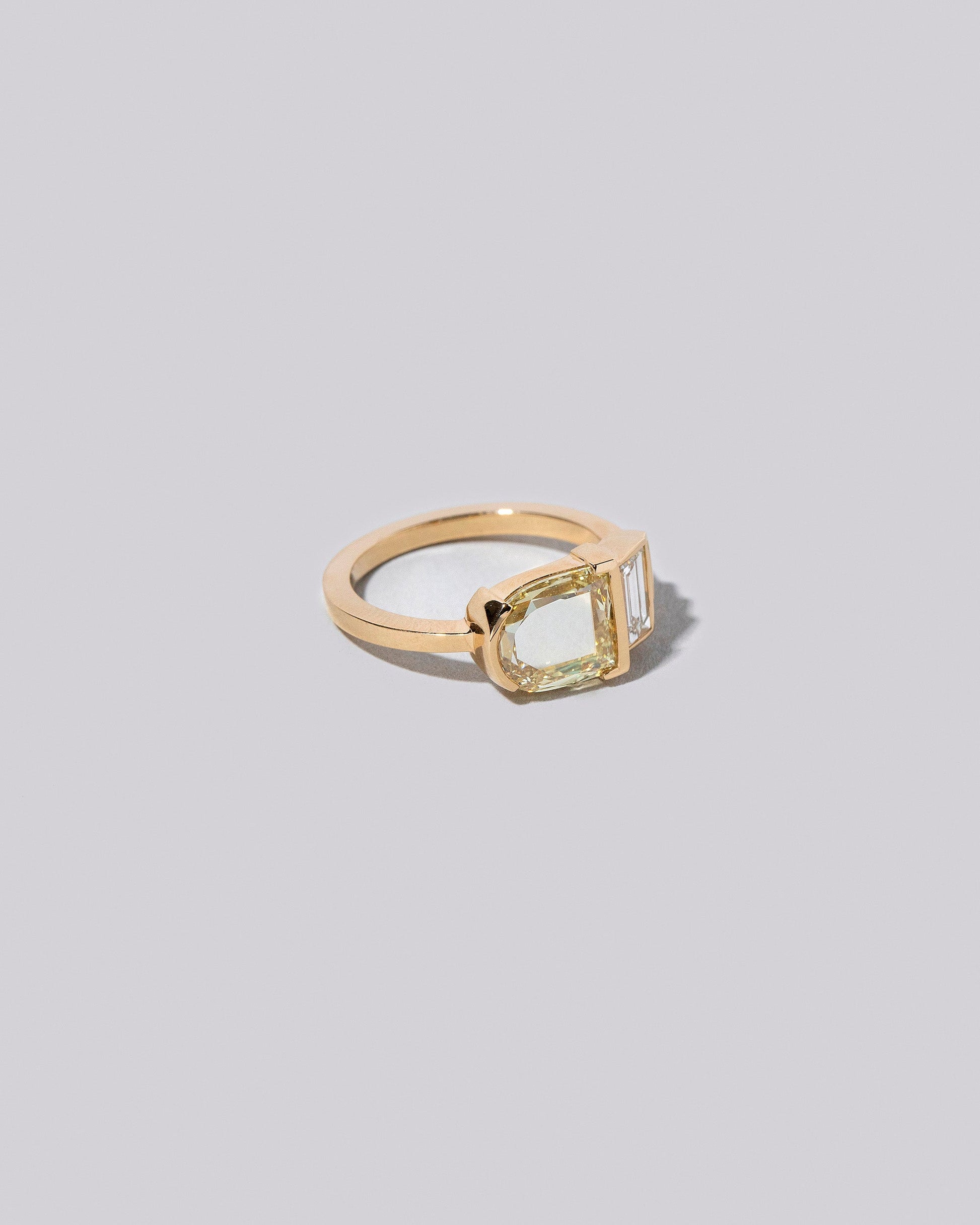 Albertine Ring on light colored background.