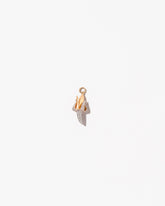 Peeled Banana Charm on light color background.