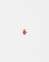 Ruby Pavé Strawberry Charm on light color background.