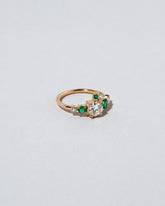  Luna Ring - White Diamond & Emerald on light color background.