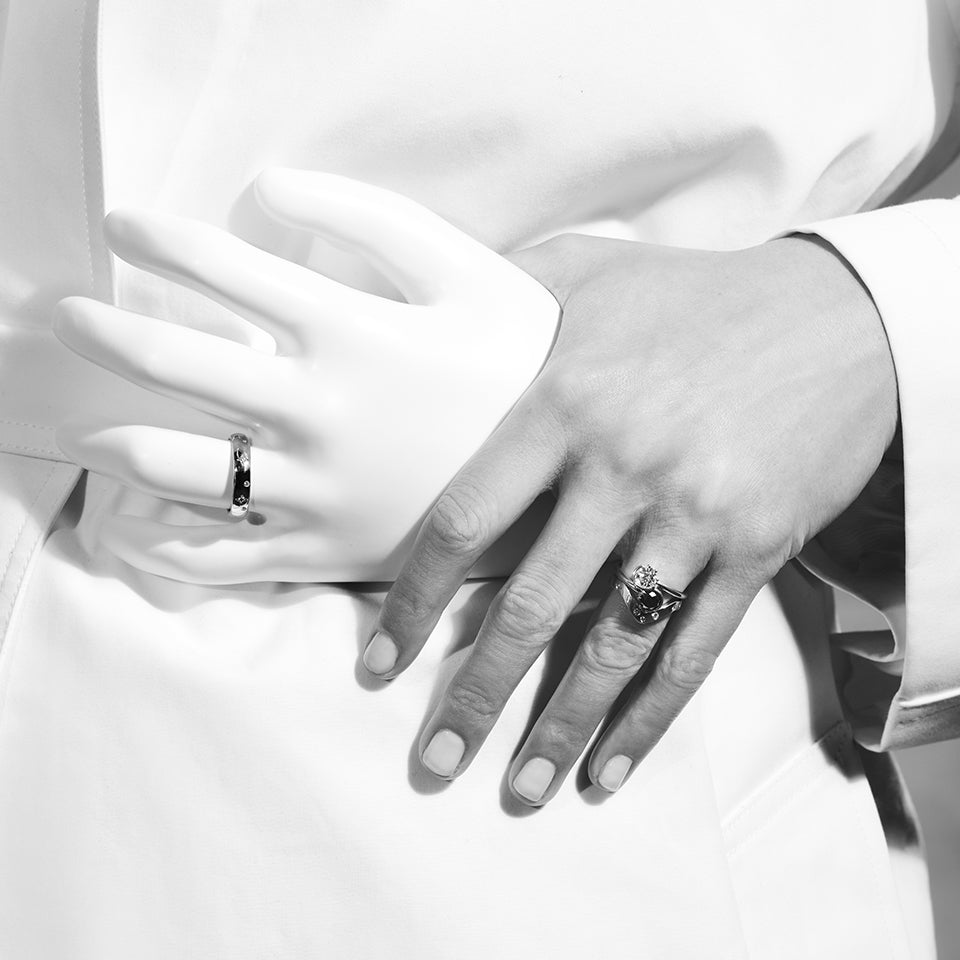 product_details::Union Ring on light color background.