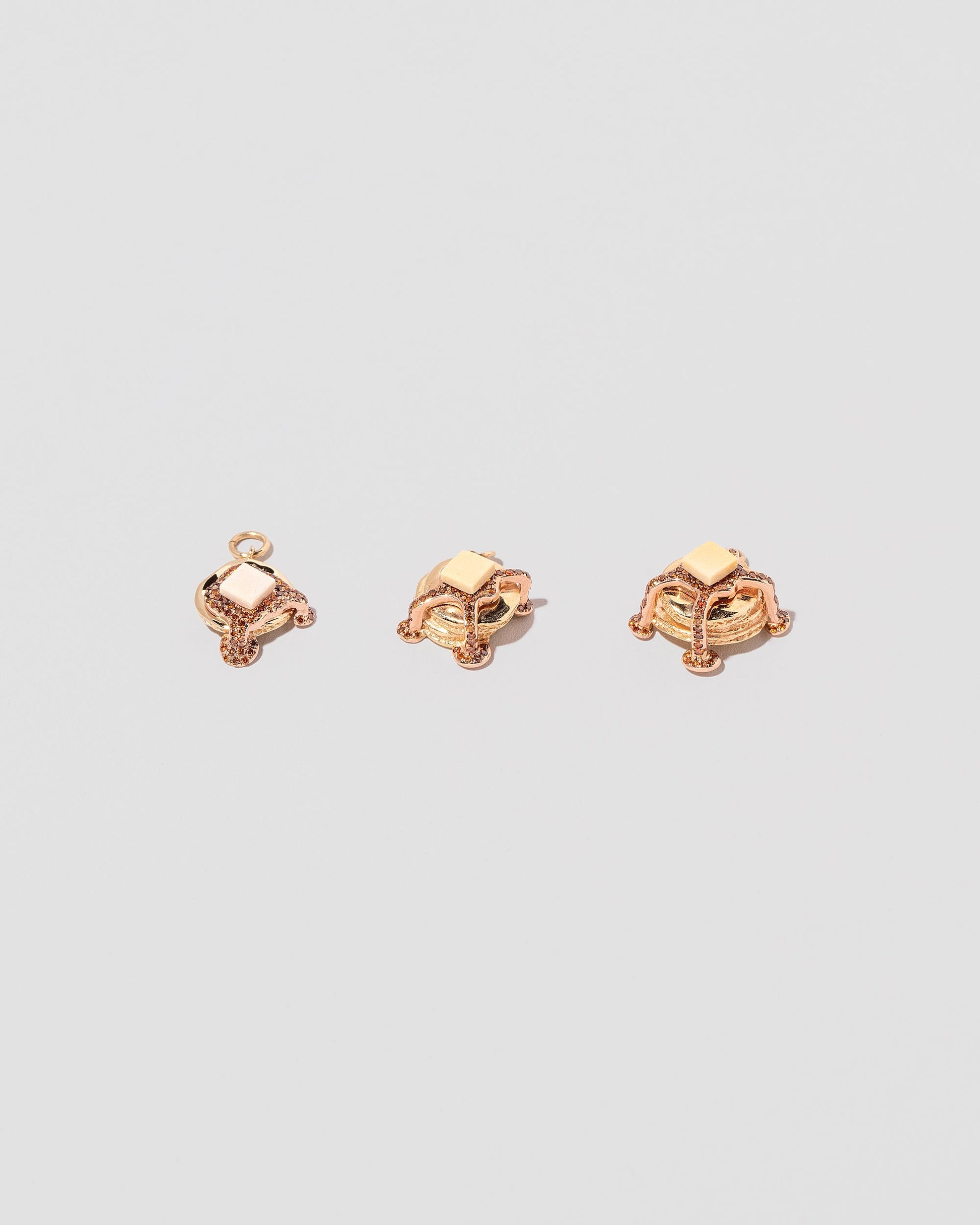 Flapjack Pancake Charm, Short Stack Pancake Charm and Tall Stack Pancake Charm on light color background.