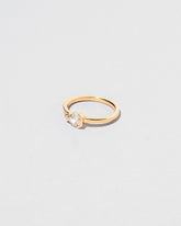 View from the side of the Serenna Ring on light color background.