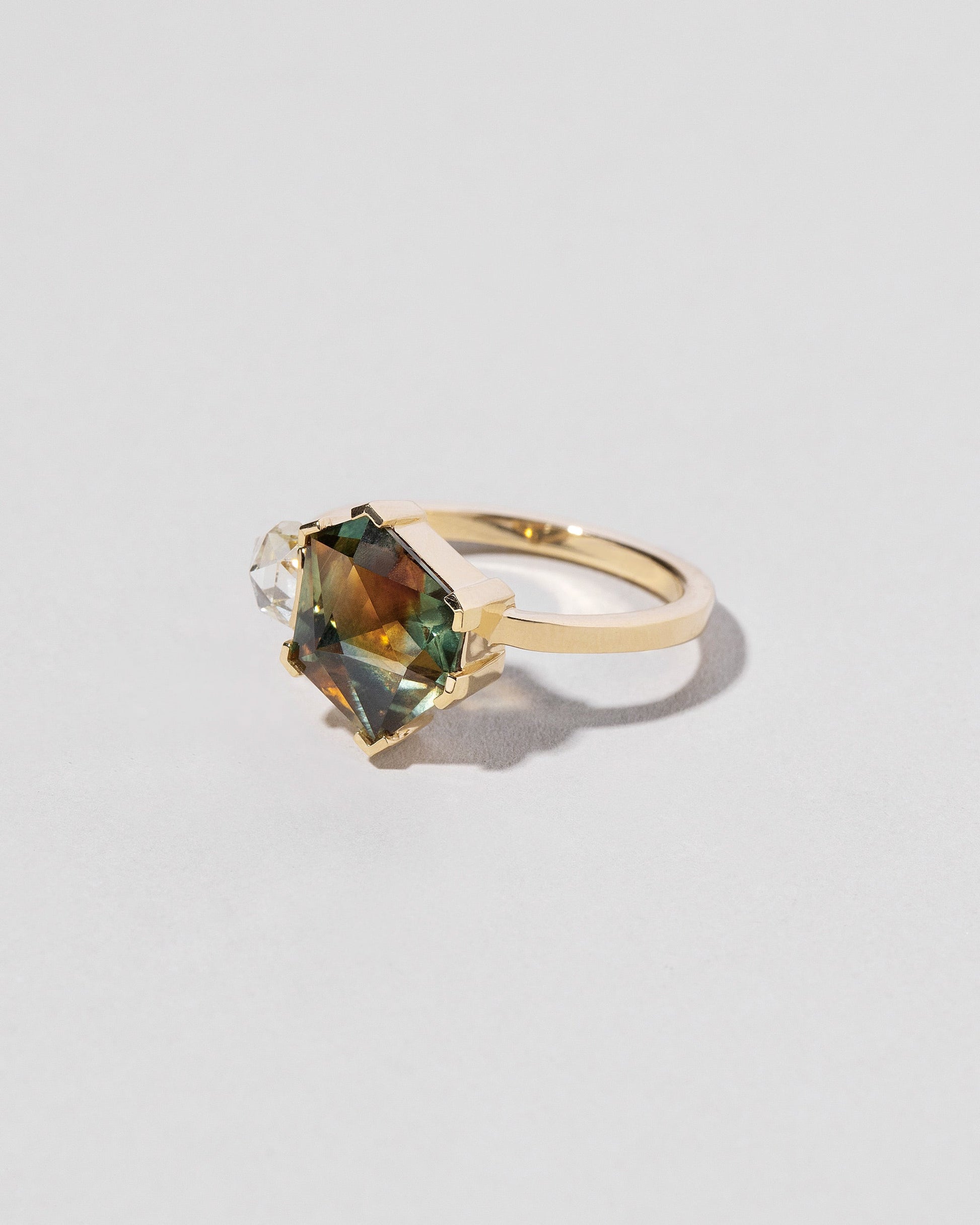  Kaleidoscope Sapphire Geometric Ring on light color background.