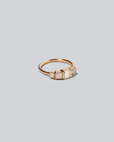 Product photo of the Lyric Ring on light light color background.
