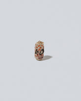 Aluminum Can Charm - La Cleos on light color background.