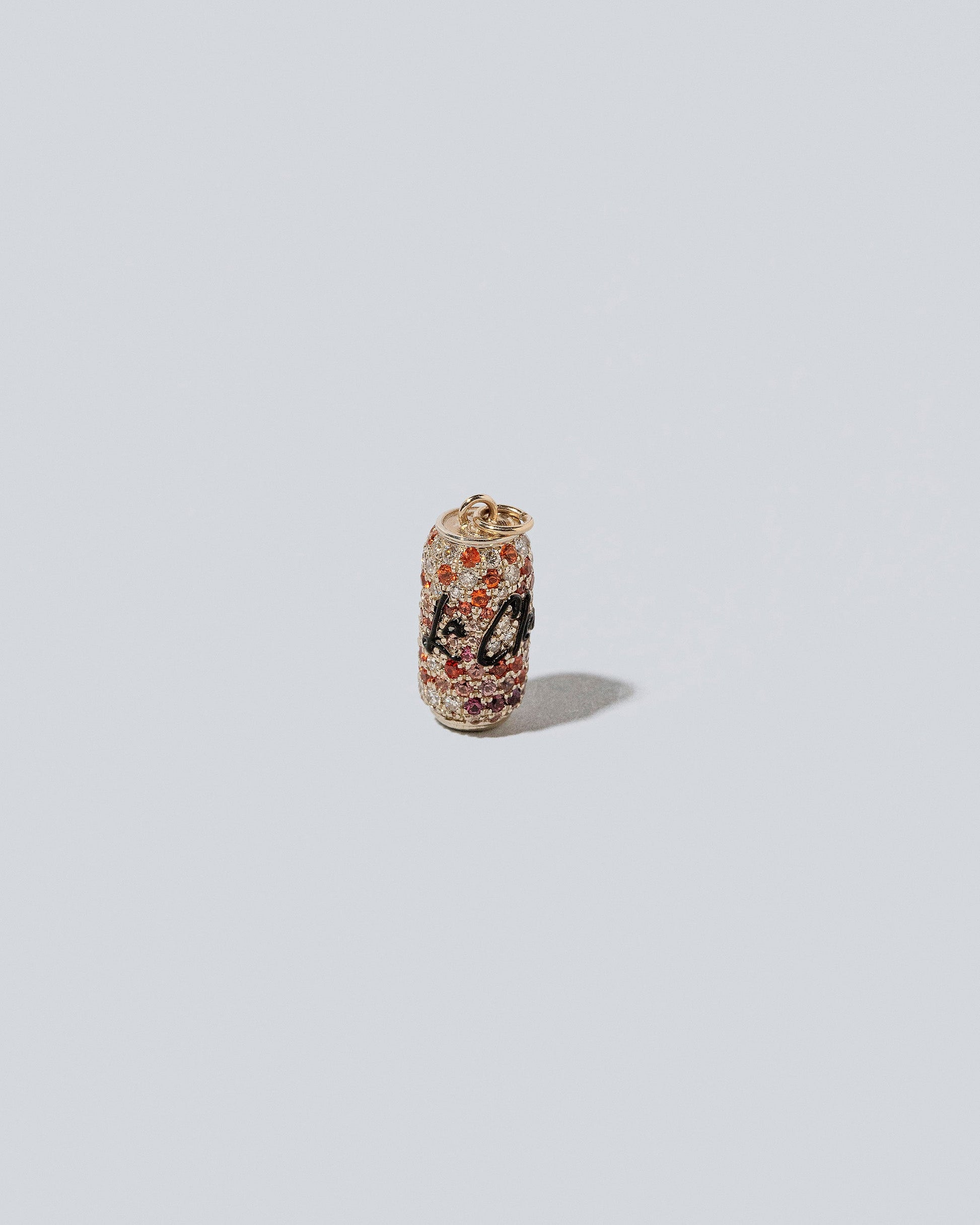 Aluminum Can Charm - La Cleos on light color background.