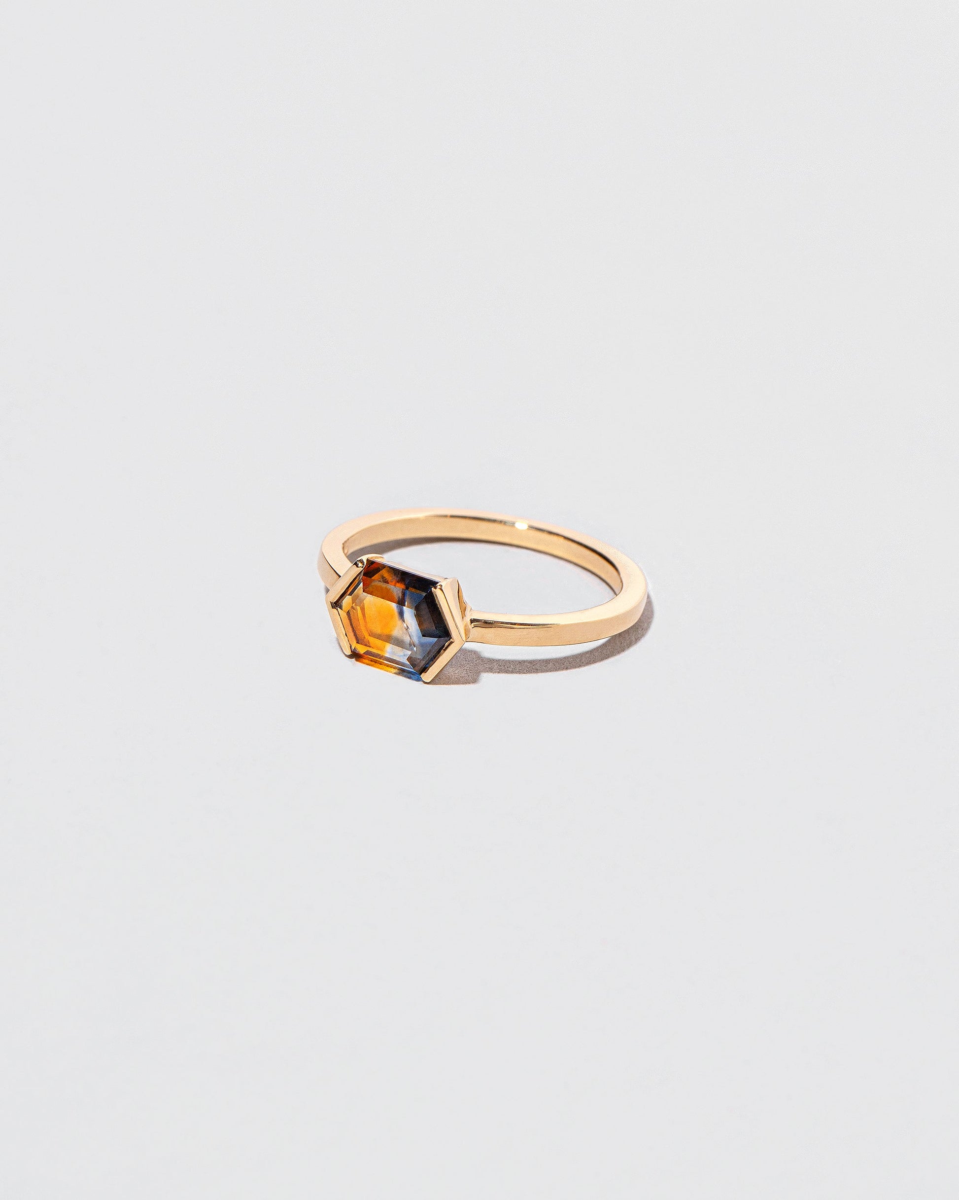 View from the side of the Elanor Ring on light color background.