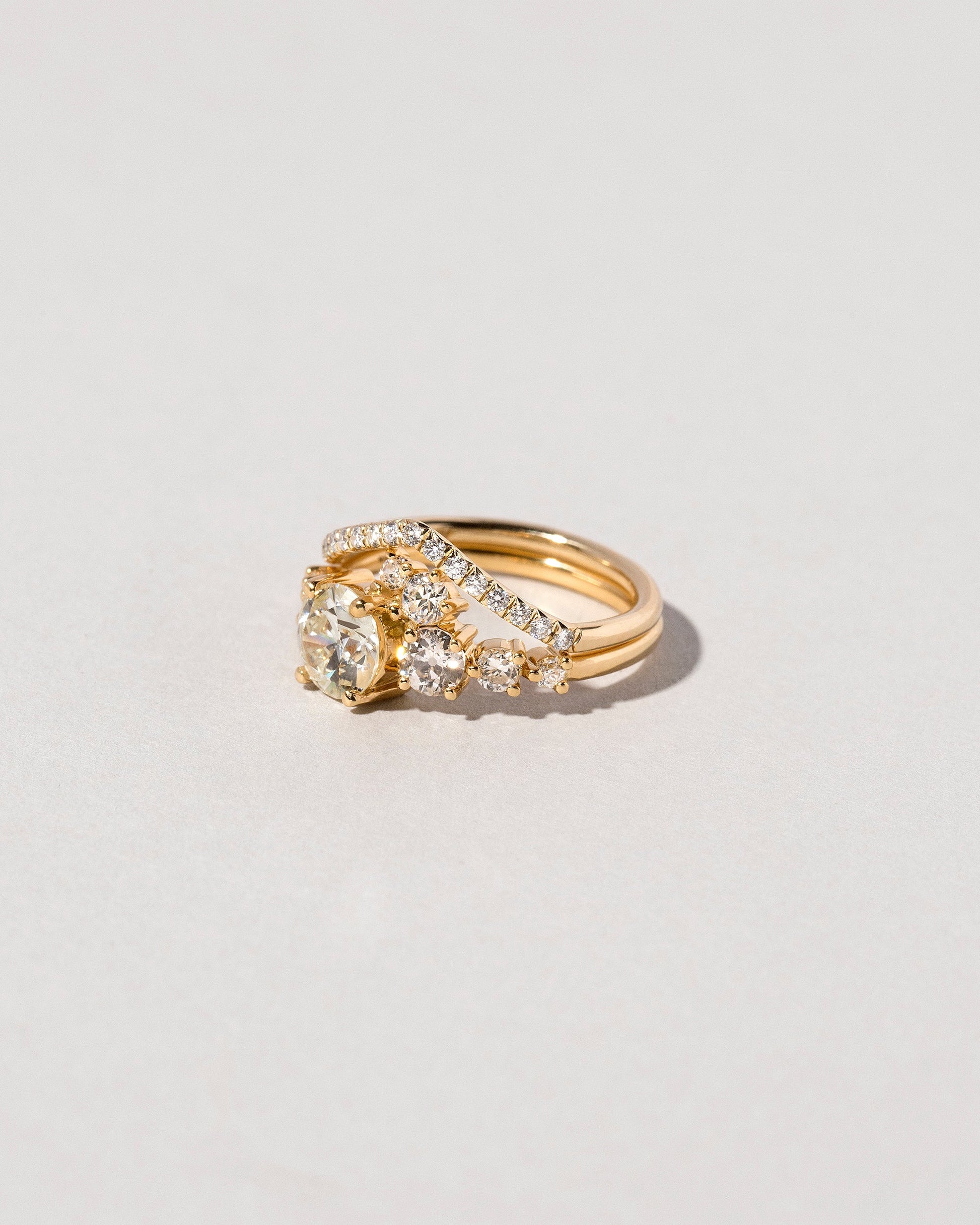 White Diamond Pavé Yellow Gold Luna Peak Band on light color background