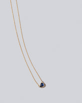Reef Necklace on light colored background.