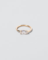  Elixer Ring on light color background.